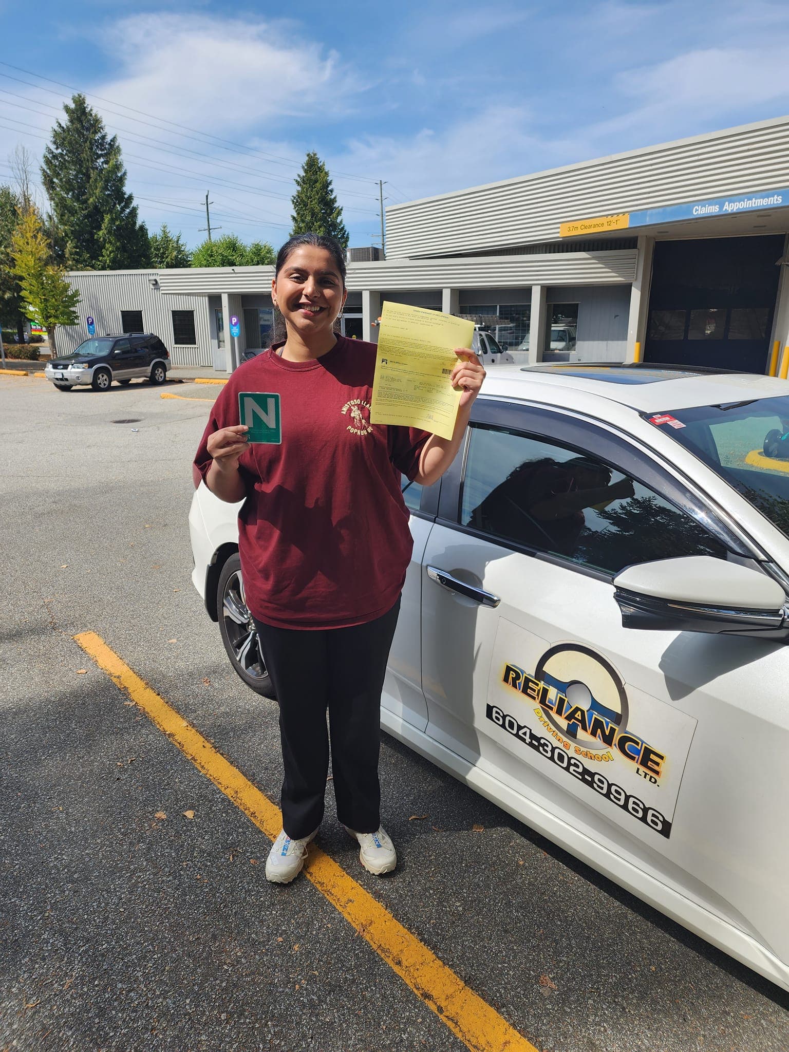 Proud student passing their Class 7 test with Reliance Driving School