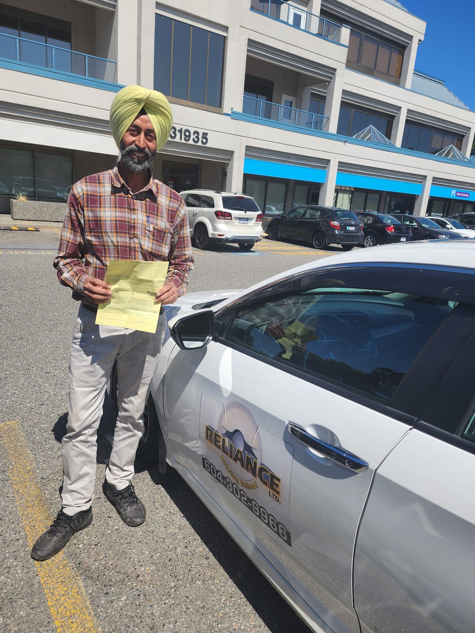 Confident new driver trained by Reliance Driving School in the Fraser Valley